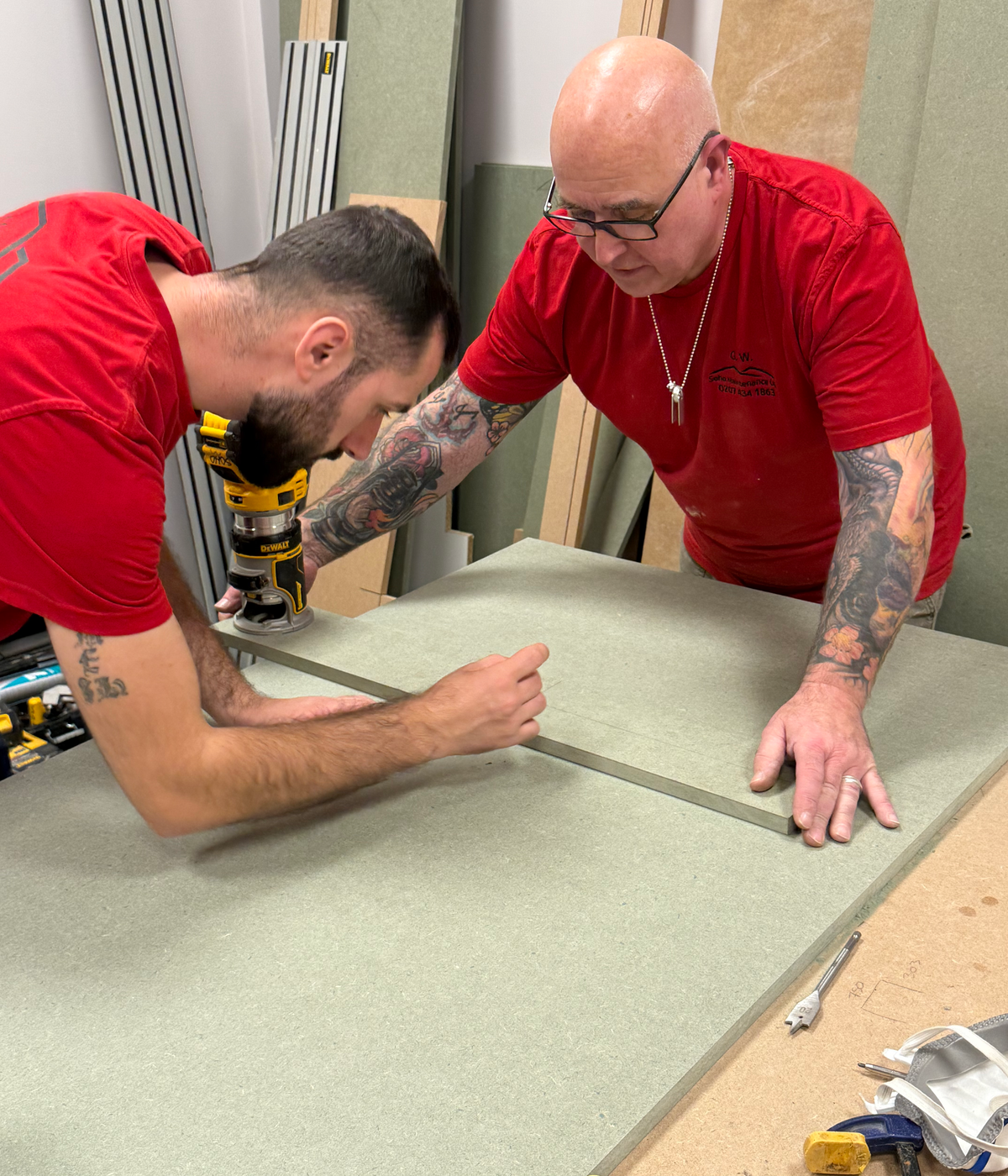 Carpenter routing a board